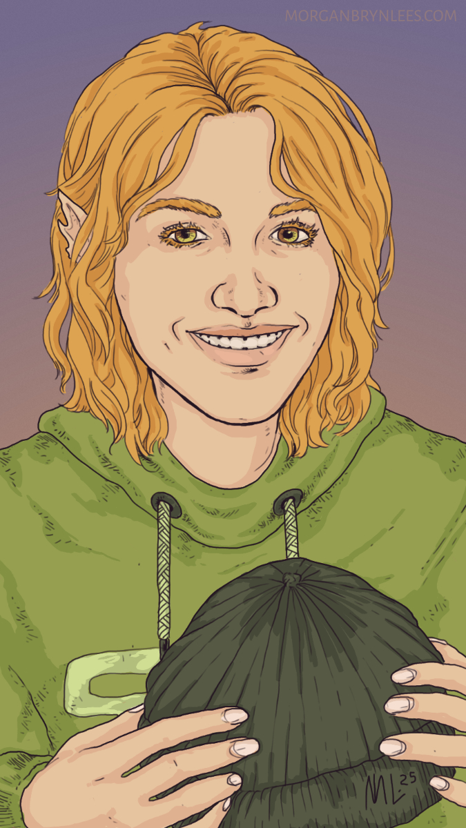 Rowan Monaghan Portrait of a person with shoulder-length blond hair, green-brown eyes, light skin, and leaf-like ears, wearing a green sweatshirt and holding a black beanie.